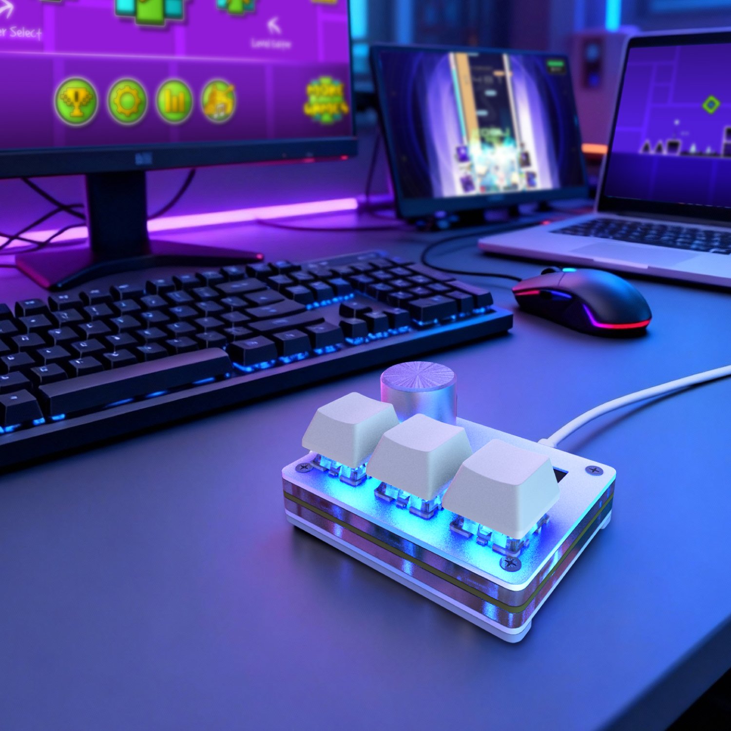 O3C rapid-trigger keypad beside a gaming keyboard and mouse